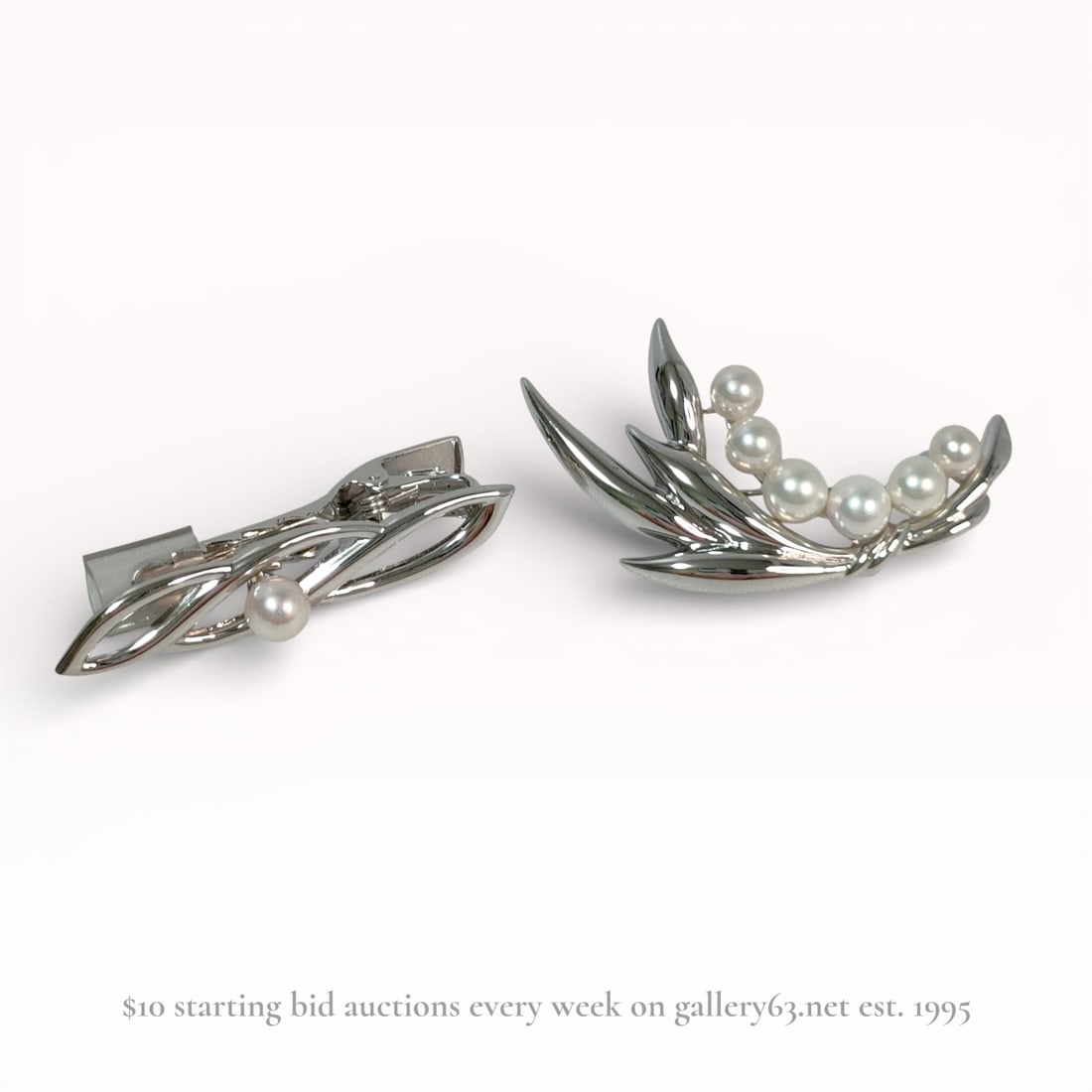 Two Mikimoto Silver and Cultured Pearl Jewelry Items: Mikimoto silver and cultured pearl brooch and tie clip, circa 1960s. The brooch features a stylized leaf spray motif set with six graduated cultured pearls and a revolving safety catch, while the clip
