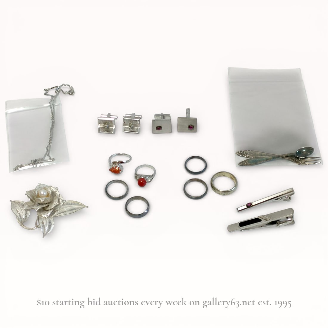 An Assortment of Silver and Silver-Toned Jewelry and Accessories (1 of 7)