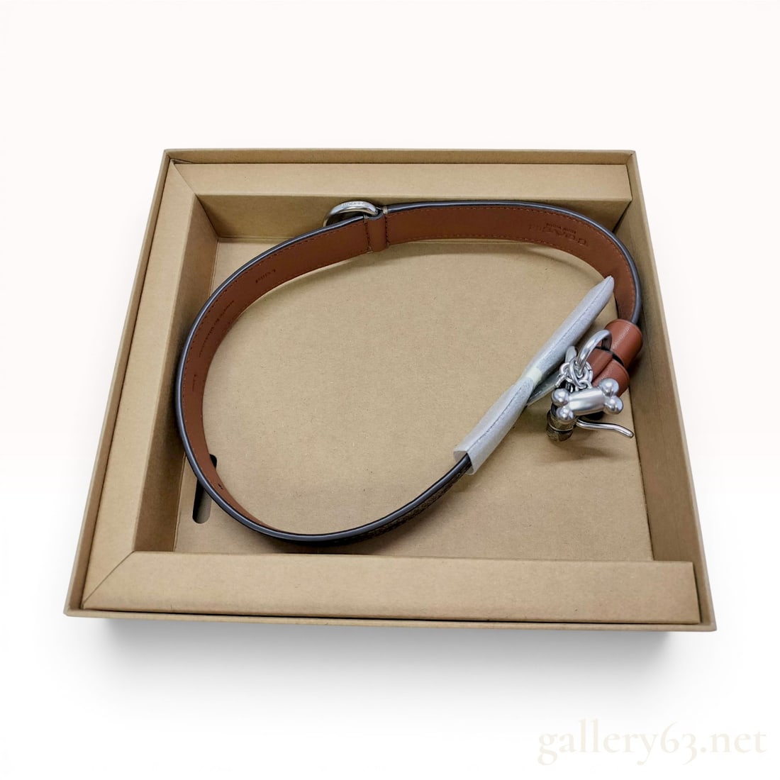 Coach Large Signature C Coated Canvas and Leather Dog Collar CH154 with Box: A Coach large pet collar featuring the signature C logo in a khaki and brown colorway. The exterior is constructed from durable coated canvas, while the interior is lined with smooth saddle-brown leat