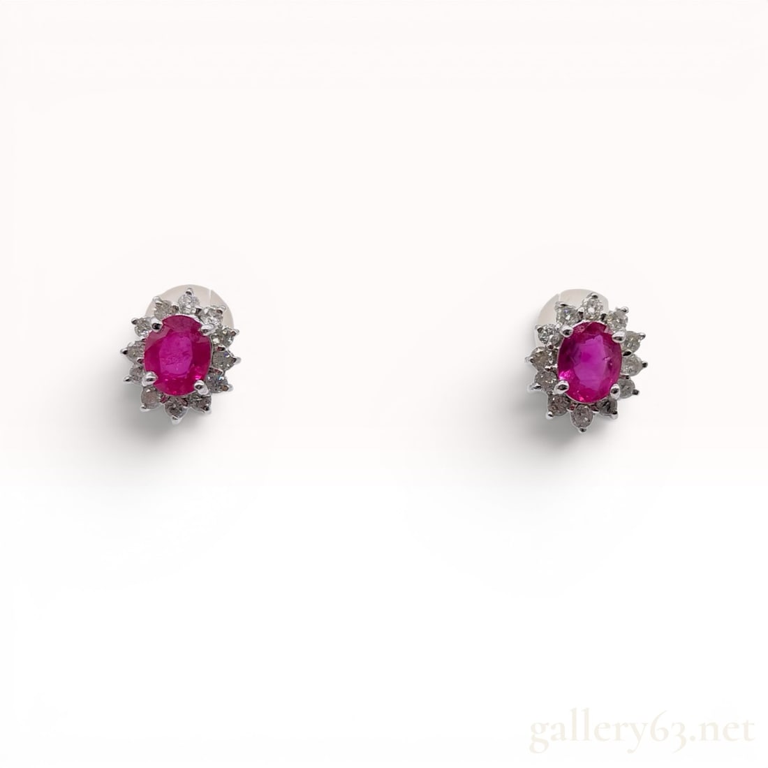 A Pair of Ruby and Diamond Cluster Stud Earrings in 18K White Gold (1 of 9)