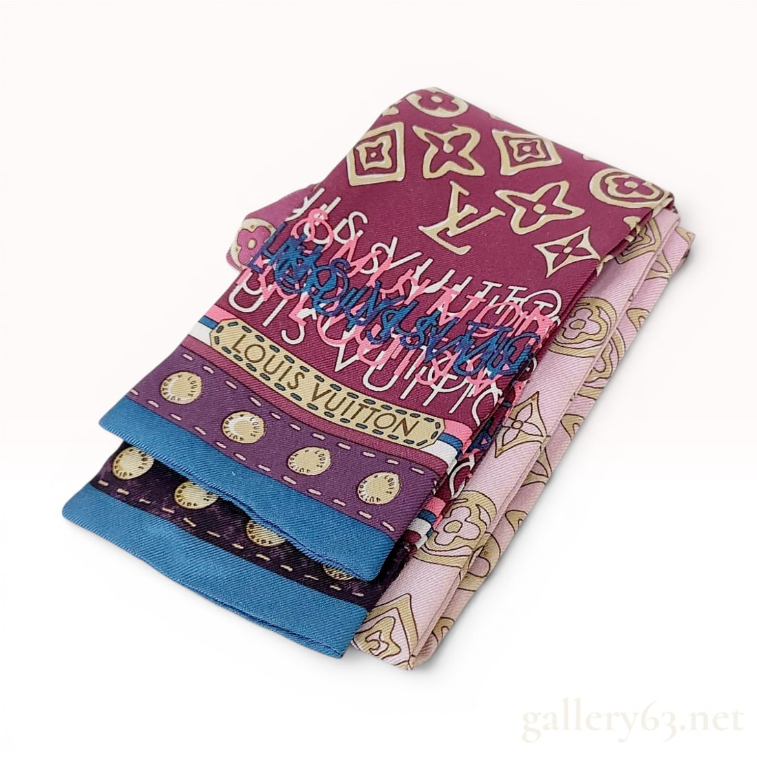 Louis Vuitton Ombre Monogram and Graffiti Silk Bandeau Scarf: A silk bandeau scarf from Louis Vuitton featuring an ombre color gradient transitioning from light pink to deep burgundy. The design incorporates the classic Louis Vuitton monogram pattern in a tan sh