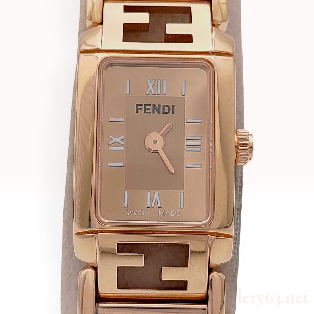 Fendi Orologi Classico Rose Gold-Tone Stainless Steel Watch 006-1200L-437 with Box: A Fendi Orologi Classico wristwatch featuring a rose gold-tone stainless steel rectangular case and an integrated link bracelet. The rose gold-tone dial displays a textured central square, rose gold-t