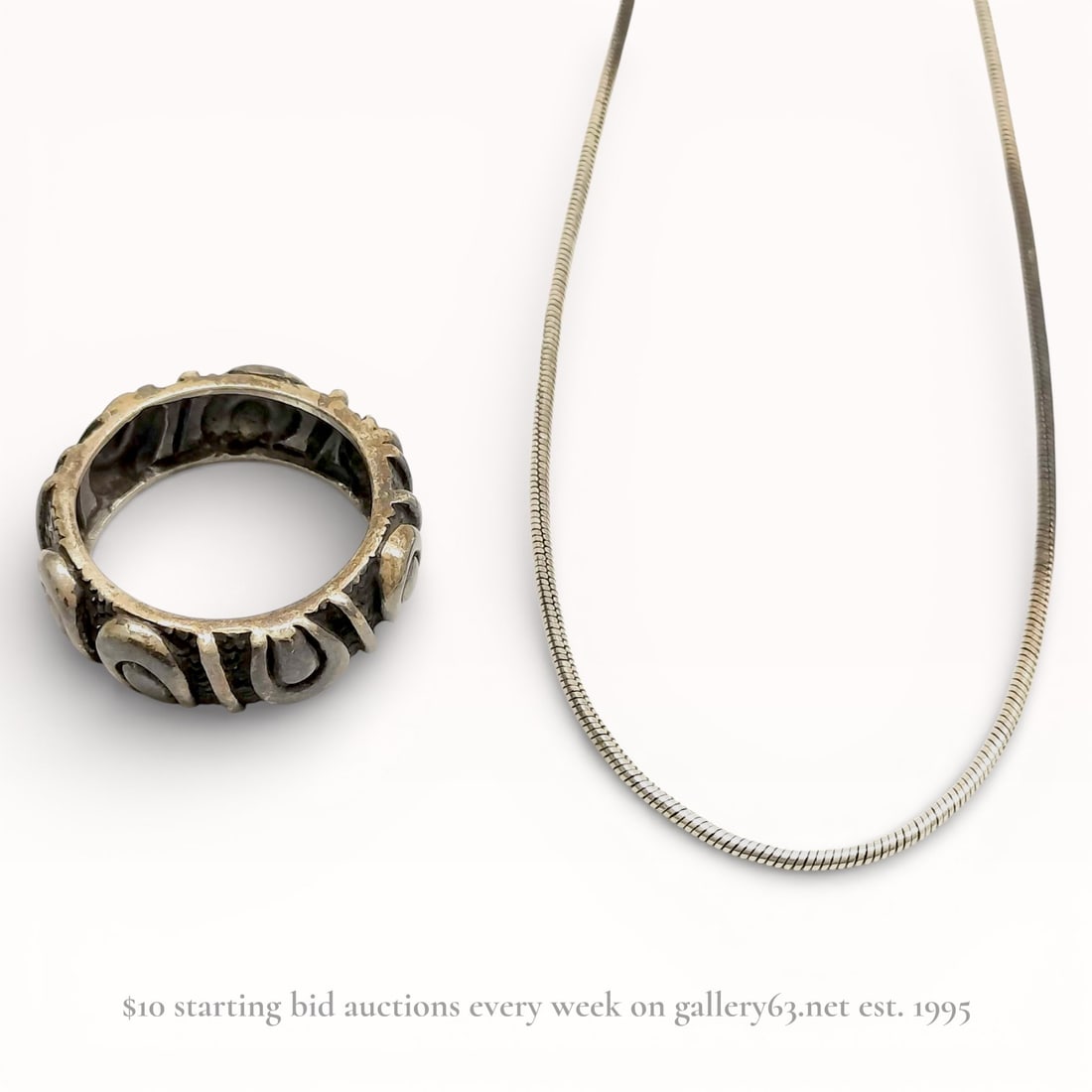 Two Sterling Silver Jewelry Items Including a Snake Chain Necklace and Artisan Band Ring (1 of 9)