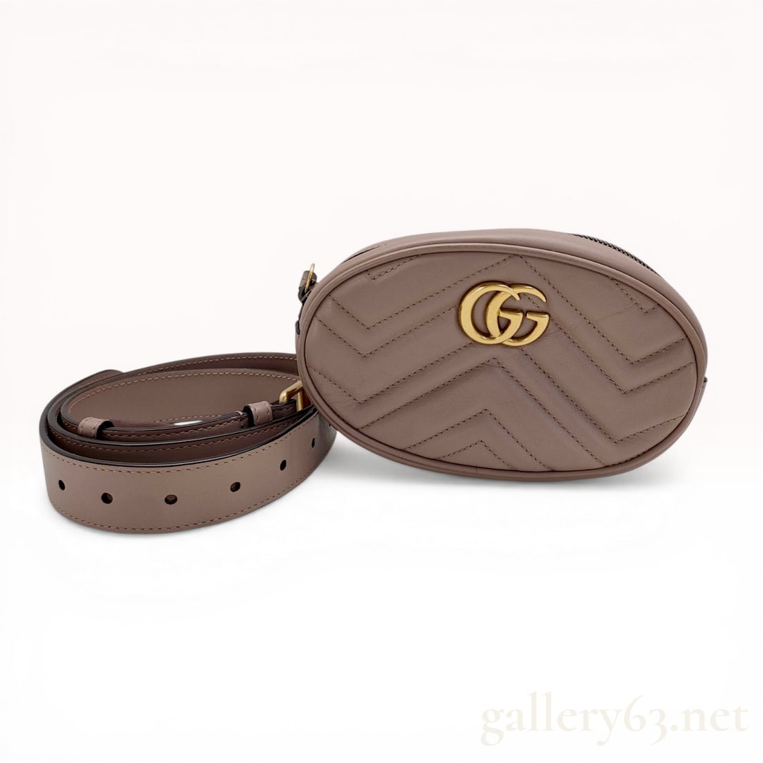 Gucci GG Marmont Matelasse Leather Belt Bag: Gucci GG Marmont matelasse leather belt bag featuring chevron stitching and a heart motif on the reverse. Crafted from dusty pink leather, the bag includes antiqued gold-tone Double G hardware and a z