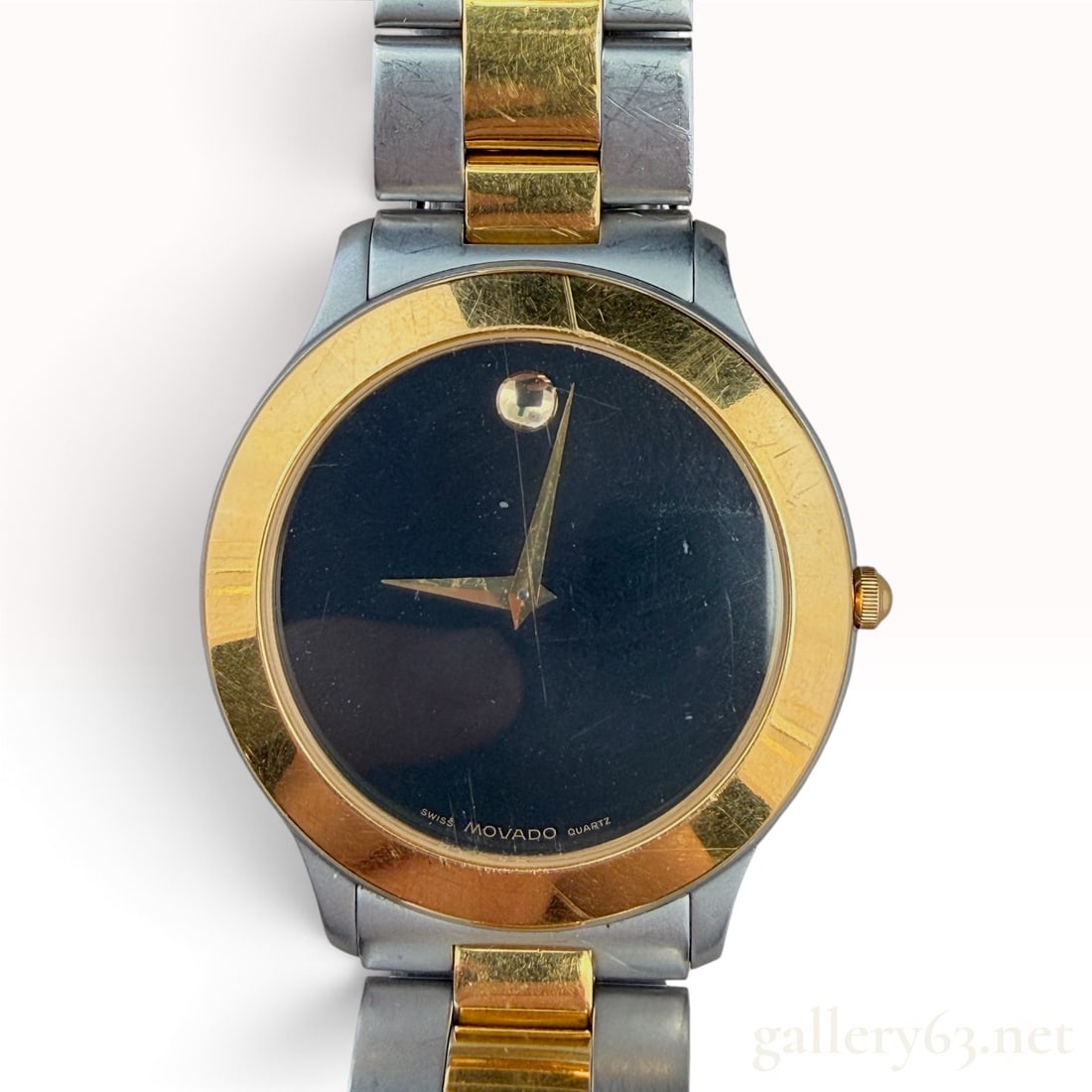 Movado Museum Watch: The lot features a Movado Museum Watch with 6" long. Please note that it needs a new battery.
