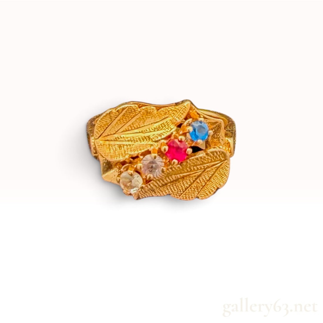 14k Multi-Gem Leaf Ring: The lot features a 14k Multi-Gem Leaf Ring with size 5.5 4.2 grams.