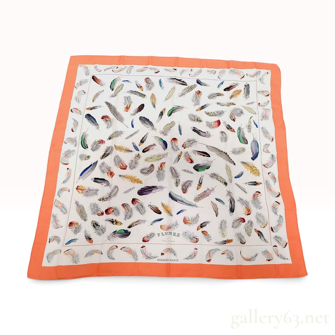Hermes Plumes Silk Scarf by Henri de Linares: This Hermes silk scarf features the Plumes pattern, a classic design by Henri de Linares originally issued in 1953. The square scarf is crafted from 100% silk twill and finished with characteristic ha