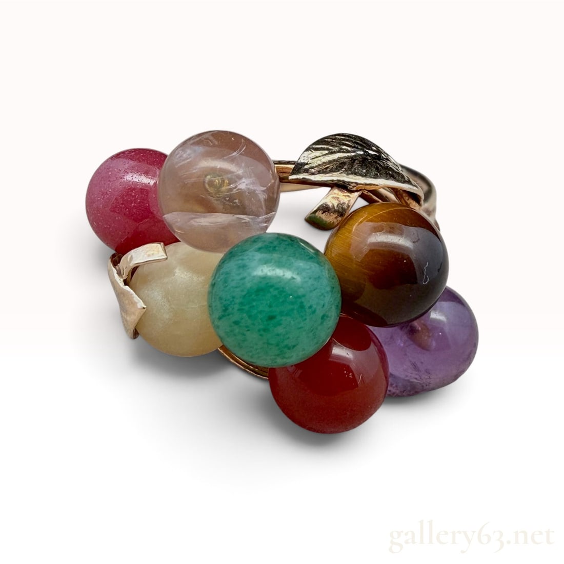 14k Multi-Gem Ring: The lot features a 14k Multi-Gem Ring with size 5.5 6.4 grams. It is offered in good estate condition.