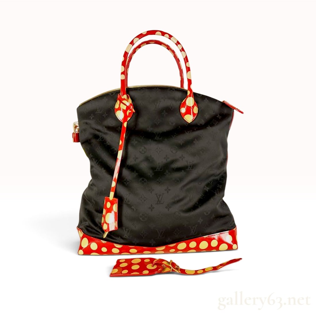 Louis Vuitton x Yayoi Kusama Infinitely Kusama Lockit MM Monogram Nylon and Vernis Handbag: A limited edition Louis Vuitton x Yayoi Kusama Lockit MM handbag from the 2012 Infinitely Kusama collection. The bag features a black monogrammed nylon fabric body with a rounded silhouette. The base,