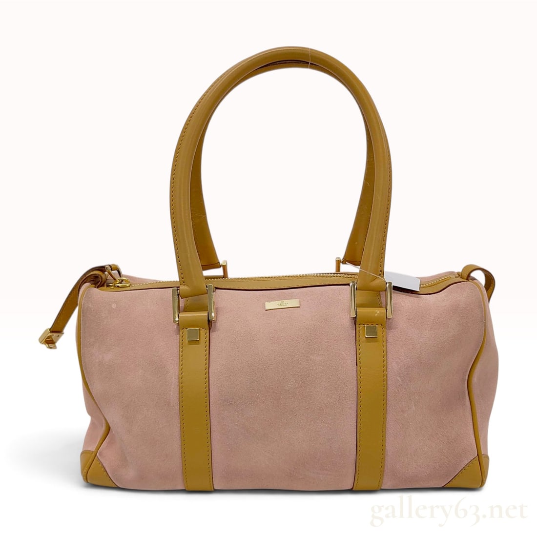 Gucci Pink Suede and Tan Leather Boston Bag: A Gucci Boston-style satchel featuring a dusty pink suede body with tan leather handles, trim, and base. The bag is designed with a rectangular silhouette and dual rolled leather top handles. The fron