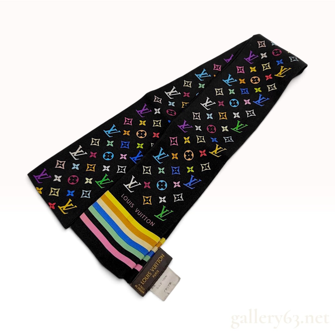 Louis Vuitton Monogram Multicolore Silk Bandeau Scarf: Louis Vuitton silk bandeau scarf featuring the Monogram Multicolore pattern on a black ground. This motif, designed in collaboration with artist Takashi Murakami, consists of vibrant, multi-colored in