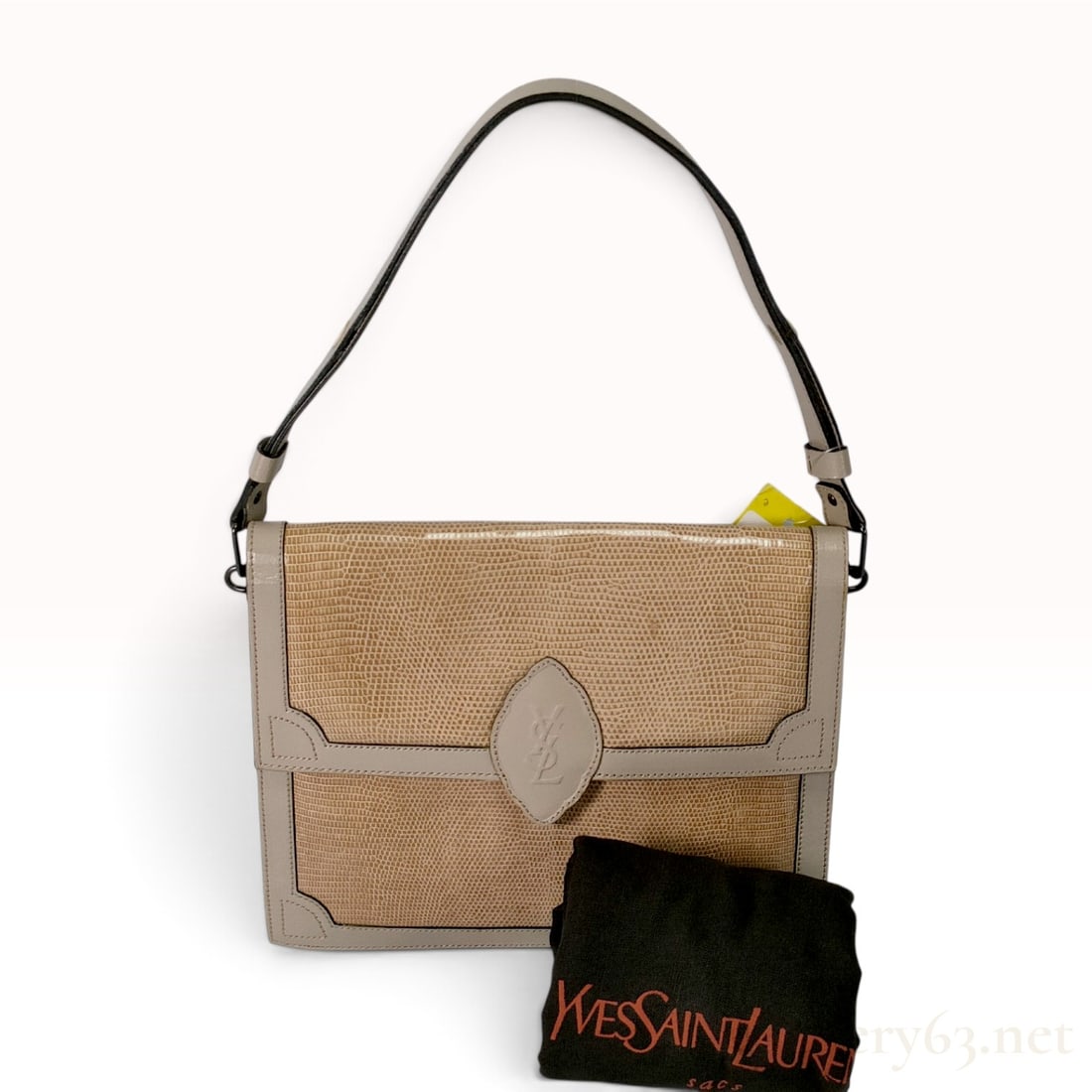 Yves Saint Laurent Vintage Genuine Lizard Leather Shoulder Bag: Yves Saint Laurent vintage flap shoulder bag featuring genuine beige lizard skin panels with smooth beige leather trim and backing. The front flap is accented with a central leaf-shaped leather patch 