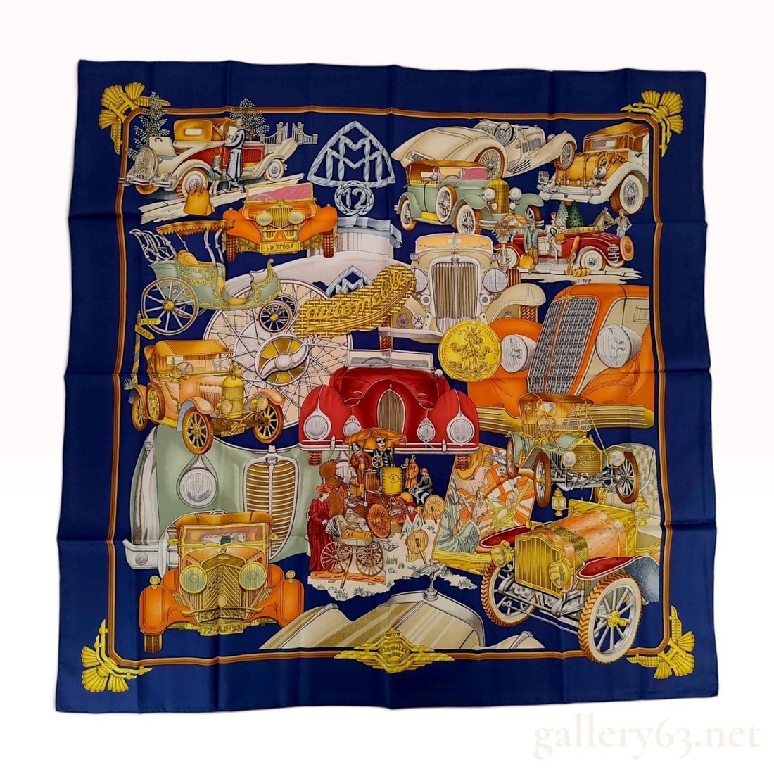 Hermes Automobile Silk Twill Scarf: A Hermes 90cm silk twill scarf featuring the Automobile pattern originally designed by Philippe Ledoux. The design presents a dense illustrative collage of vintage luxury motorcars, mechanical compone