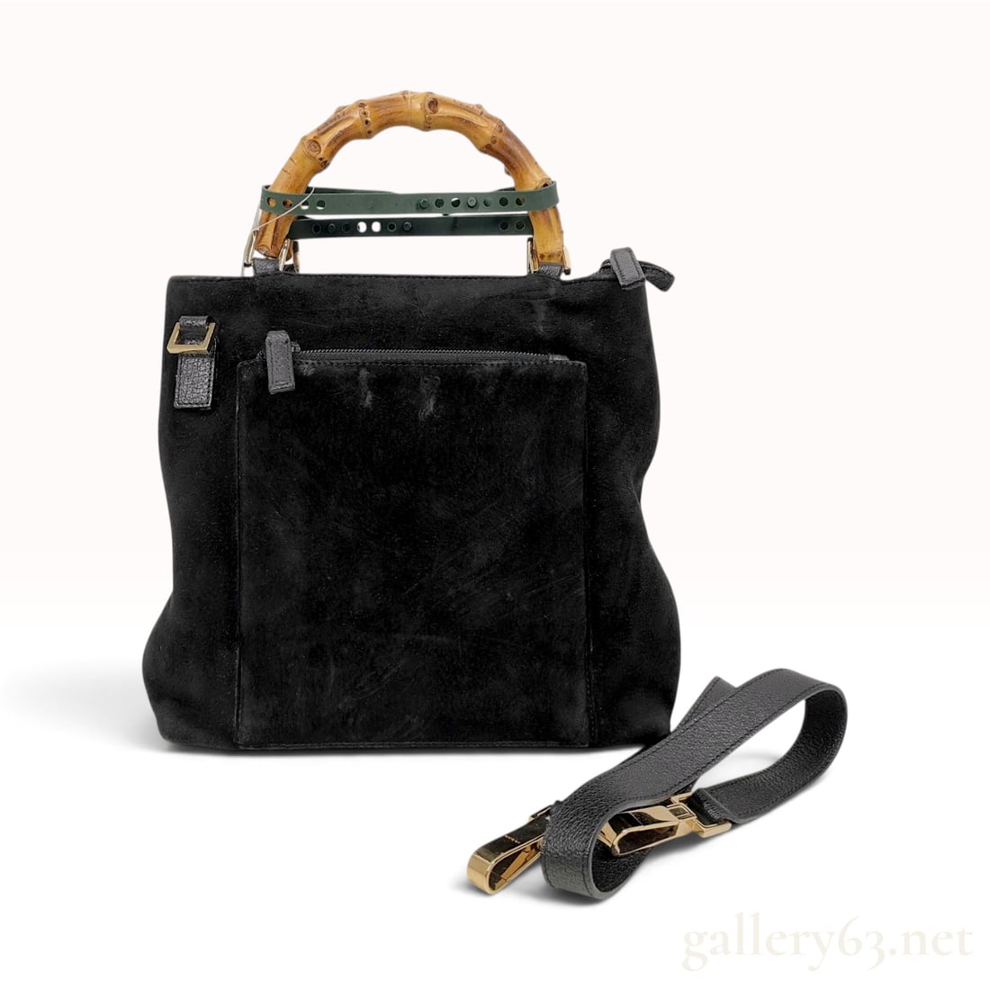 Gucci Black Suede and Pebbled Leather Bamboo 2-Way Tote Bag: A Gucci Bamboo 2-Way tote bag crafted from black suede with a pebbled leather base. This signature design features twin natural curved bamboo top handles and includes a detachable black pebbled leathe