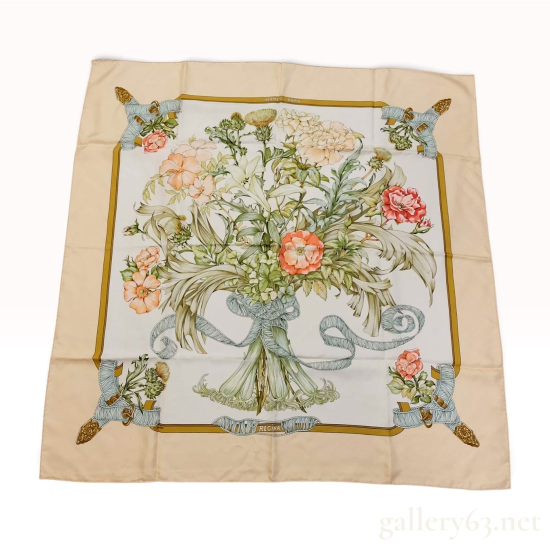 Hermes Regina Silk Carre 90 Scarf by Leila Menchari: A vintage Hermes silk twill Carre 90 scarf in the Regina pattern, originally designed by artist Leila Menchari and first issued in 1972. The central motif features a realistic bouquet of flowers, incl