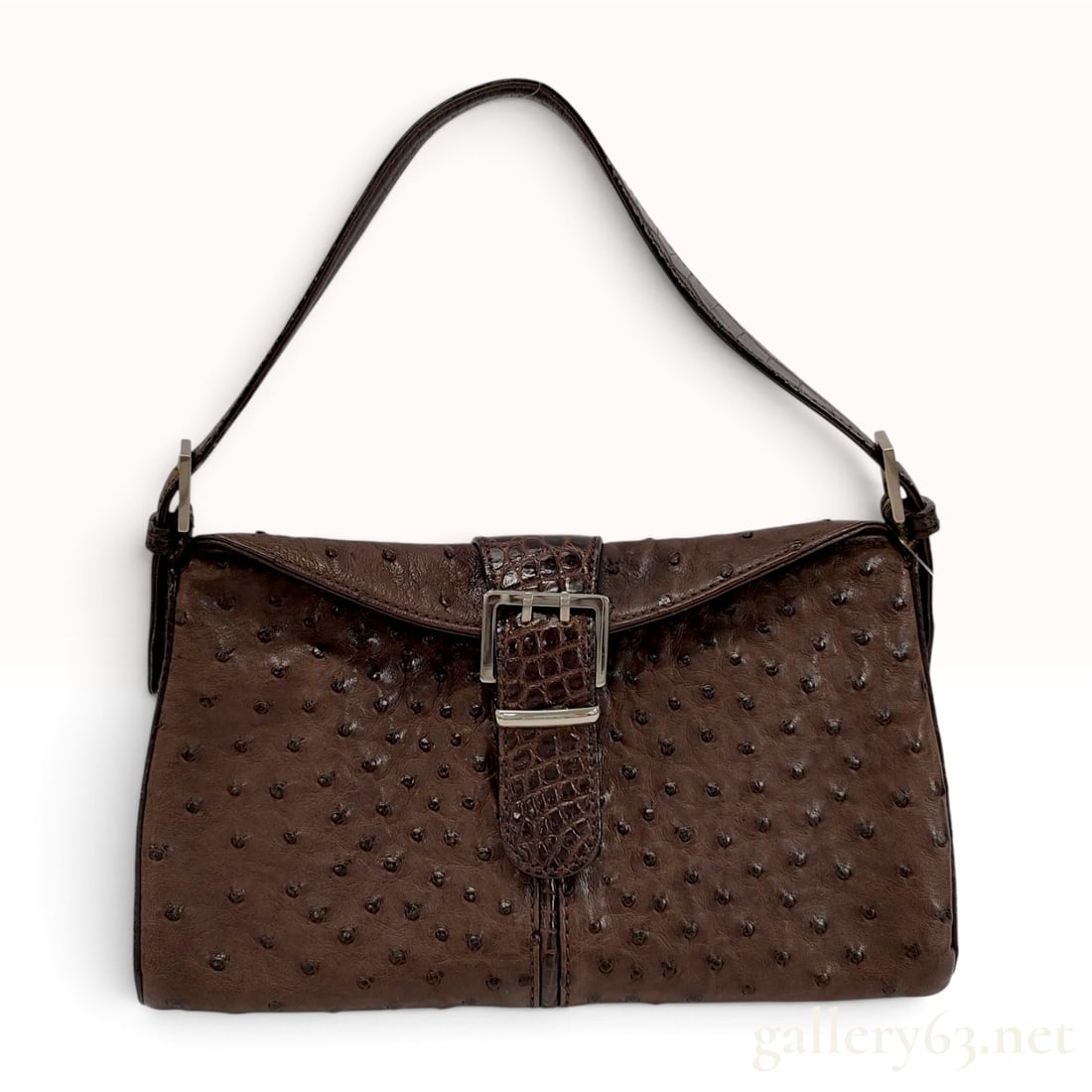 Roberta di Camerino Ostrich and Caiman Leather Baguette Shoulder Bag: This shoulder bag by Roberta di Camerino is constructed from dark brown genuine ostrich skin, featuring characteristic quill follicles across the main body. Designed in a classic baguette style, it fe