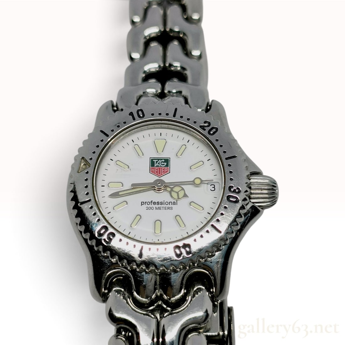 TAG Heuer S/el Professional 200 Meters Ladies Watch S90.808: TAG Heuer S/el (Sports and Elegance) Professional 200 Meters ladies quartz wristwatch, reference S90.808. The watch features a brushed and polished stainless steel case with a unidirectional rotating 
