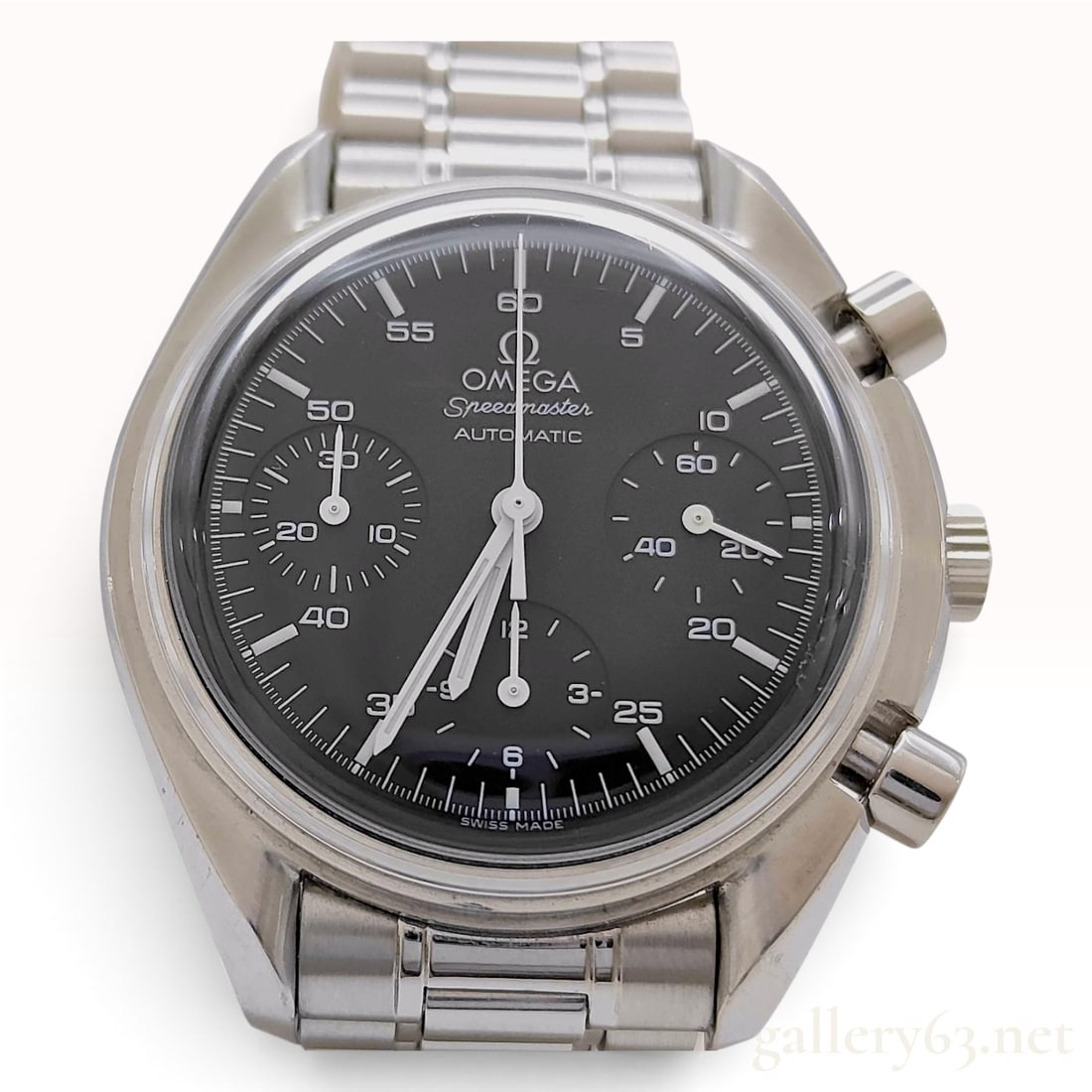 Omega Speedmaster Automatic Reduced Chronograph Wristwatch Ref 3510.50: An Omega Speedmaster Automatic Reduced chronograph wristwatch featuring a stainless steel case and original link bracelet. The matte black dial is detailed with three sub-dials at the 3, 6, and 9