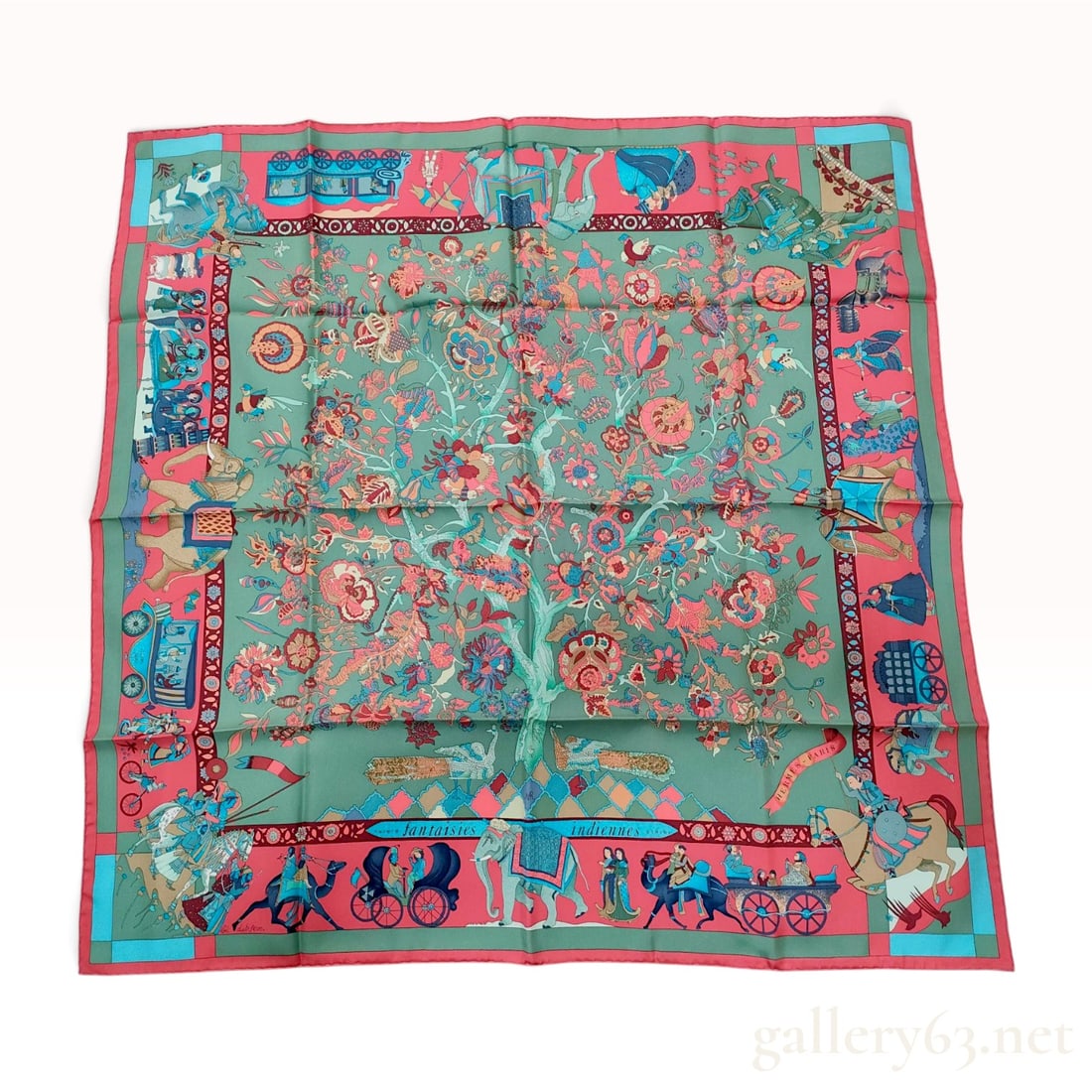 Hermes Fantaisies Indiennes Silk Carre 90 Scarf: An Hermes 100 percent silk twill carre 90 scarf featuring the Fantaisies Indiennes pattern, designed by artist Loic Dubigeon. The design centers on a Tree of Life motif with elaborate floral and folia