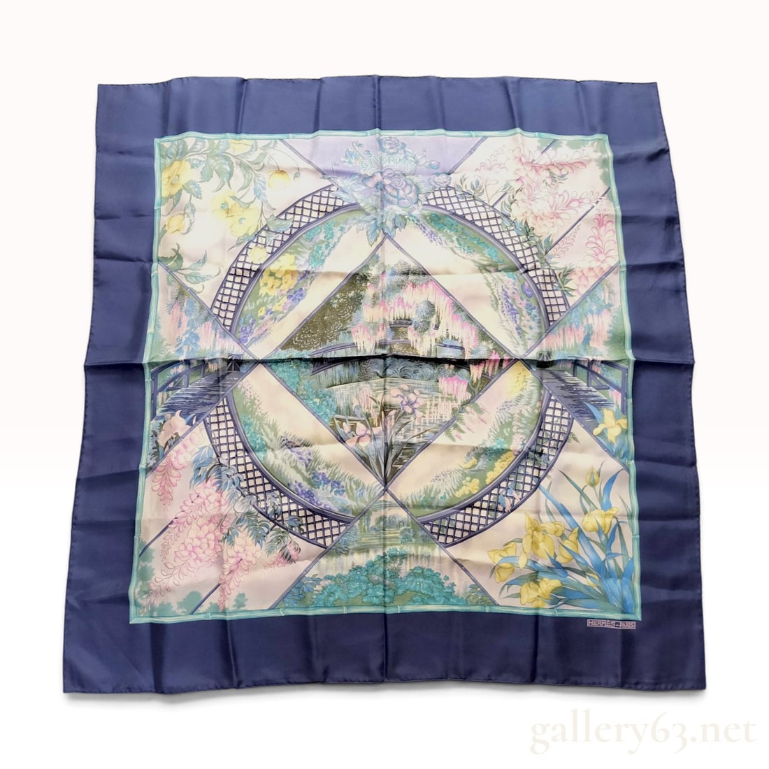 Hermes Giverny Silk Carre 90: This is a Hermes silk carre 90 in the Giverny pattern designed by Laurence Bourthoumieux. The design depicts botanical scenes from Claude Monet's garden at Giverny, including the Japanese bridge, wist