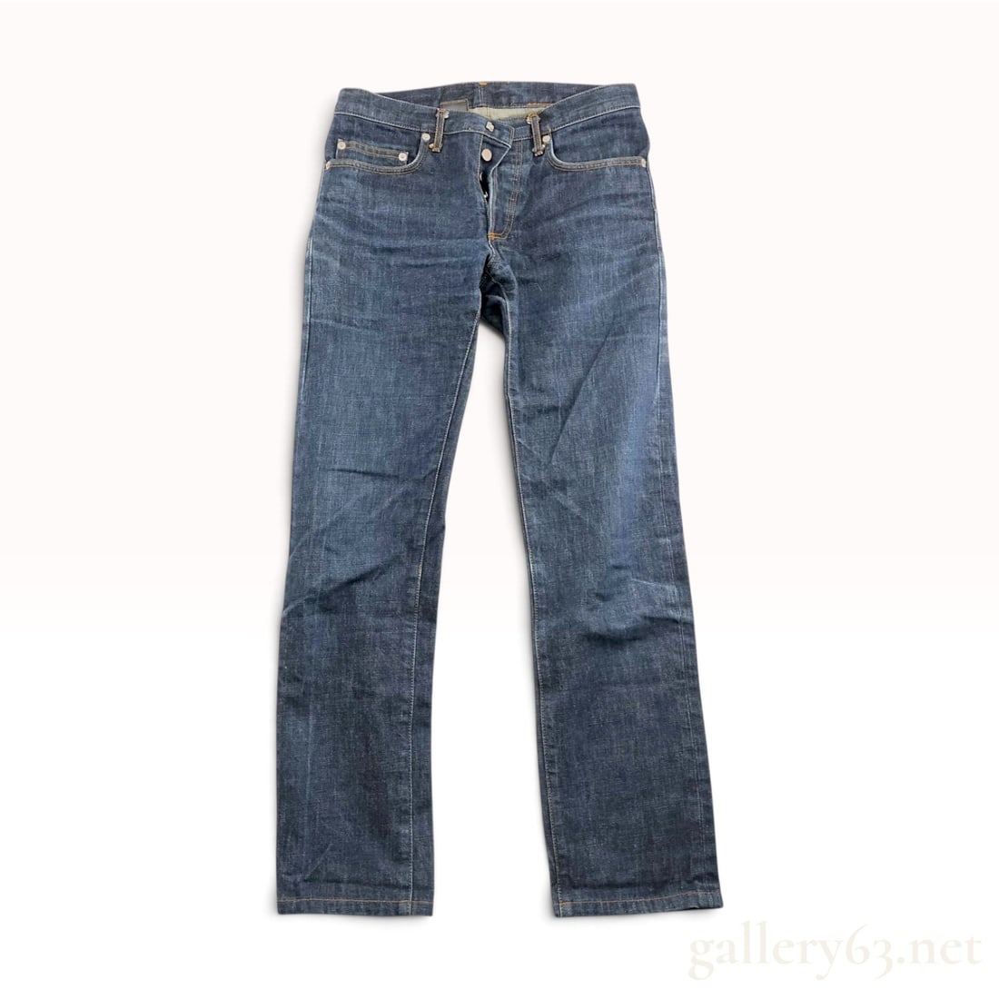 Dior Homme Spring Summer 2005 Hedi Slimane Indigo Denim Jeans: Dior Homme straight-leg denim jeans from the Spring Summer 2005 collection designed by Hedi Slimane. The garment is constructed from 100 percent cotton indigo-dyed denim featuring tobacco-colored