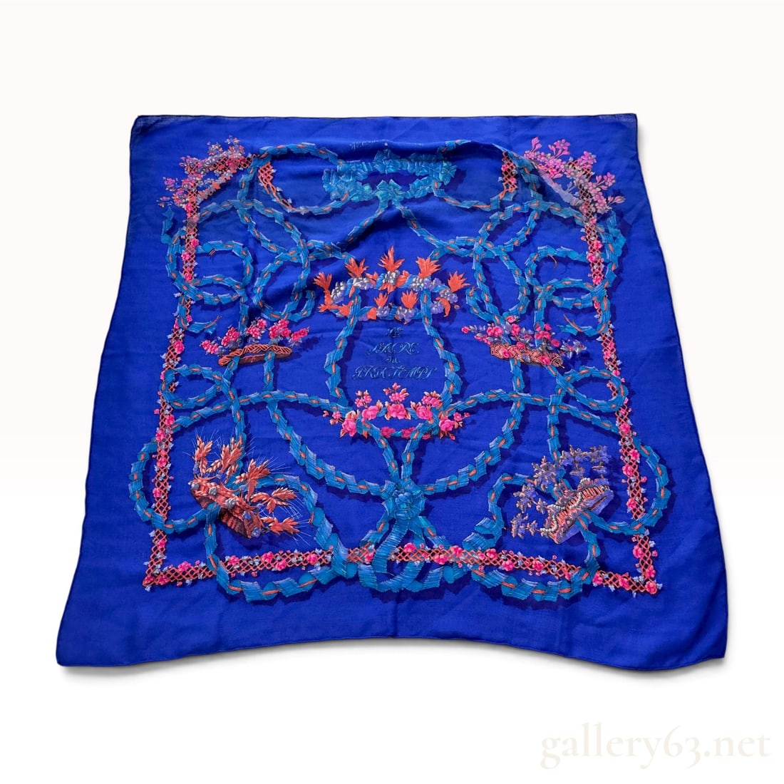 Vintage Hermes Le Sacre du Printemps Cashmere and Silk Scarf by Henri d'Origny: Hermes cashmere and silk blend scarf in the Le Sacre du Printemps (The Rite of Spring) pattern, designed by Henri d'Origny. The design features a vibrant royal blue ground decorated with ornate blue r