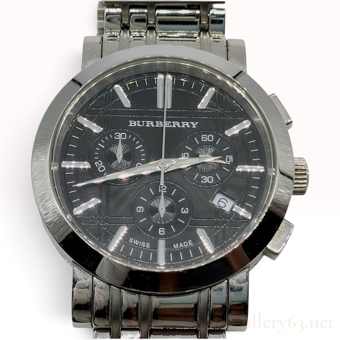 Burberry Heritage Chronograph BU1366 Stainless Steel Wristwatch: This is a Burberry Heritage Chronograph wristwatch, reference number BU1366, featuring a Swiss-made quartz movement. The watch is constructed with a stainless steel case and an integrated stainless st