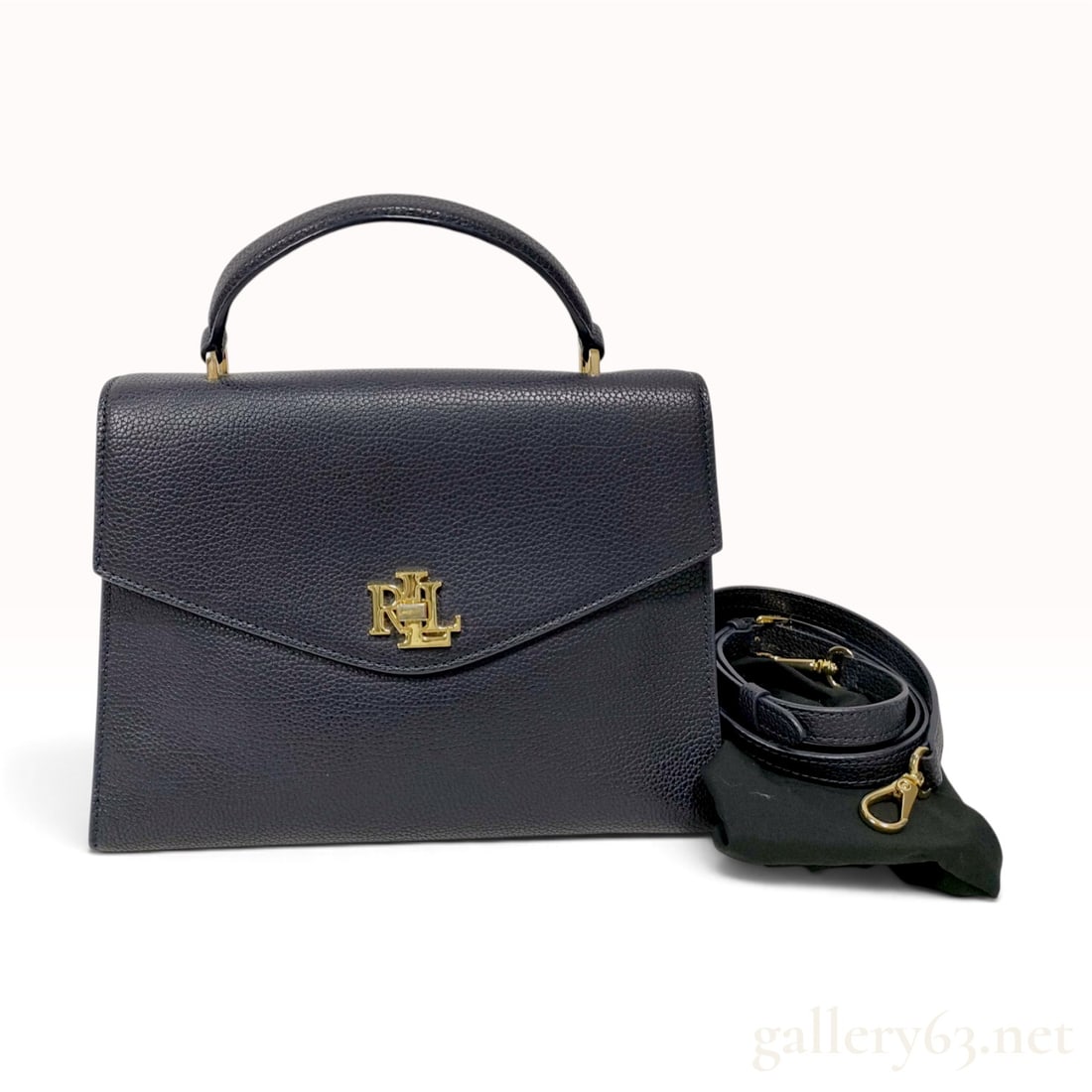 Lauren Ralph Lauren Pebbled Leather Medium Farrah Satchel: Lauren Ralph Lauren Medium Farrah Satchel crafted from navy blue pebbled leather. This structured top-handle bag features gold-tone hardware and is secured with a front interlocking RL monogram turn-l