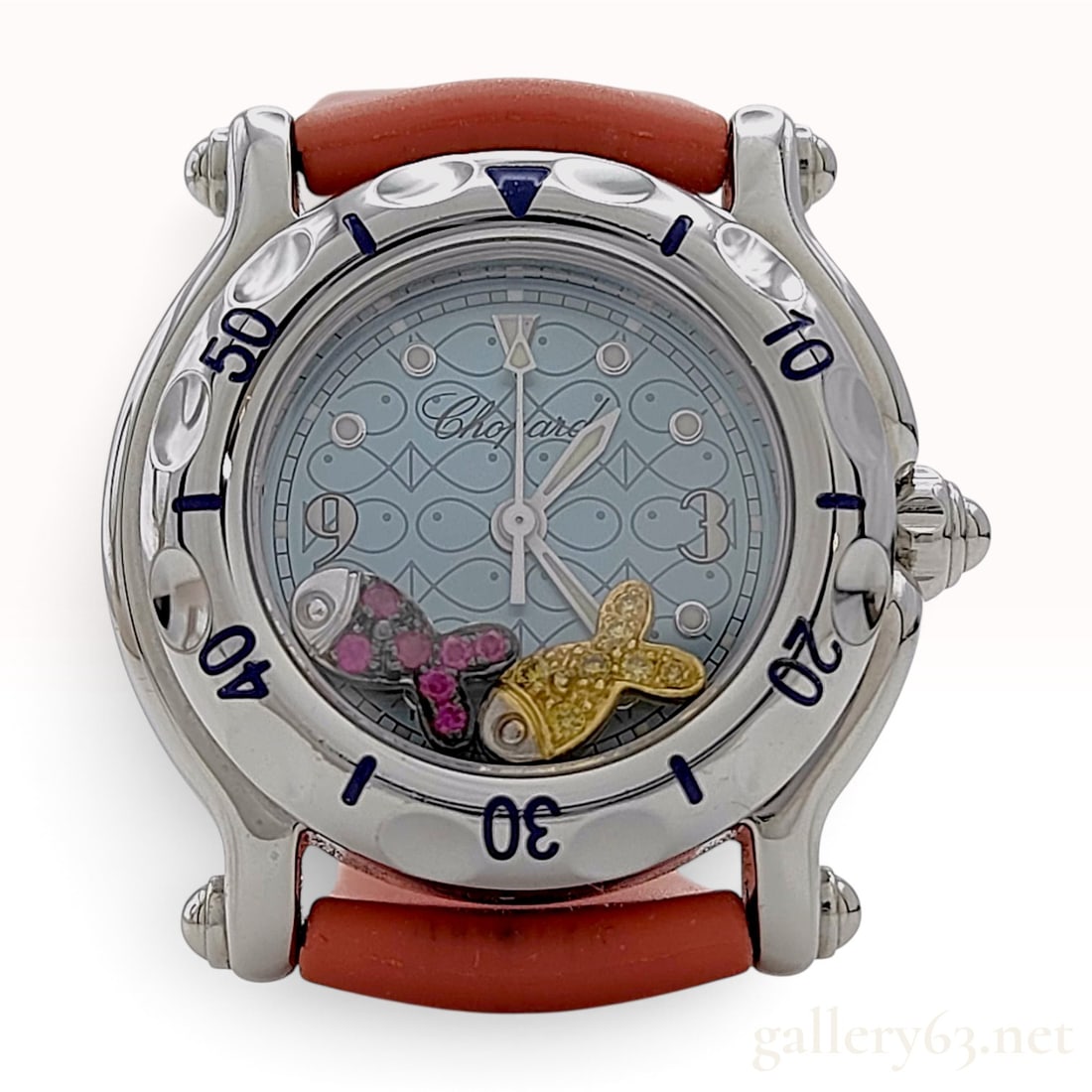 Chopard Happy Sport Happy Fish Stainless Steel Quartz Wristwatch Ref. 27/8923: Chopard Happy Sport Happy Fish stainless steel wristwatch, reference 27/8923. The circular stainless steel case features a bezel with recessed blue-filled numerical markers and blue cabochons set into