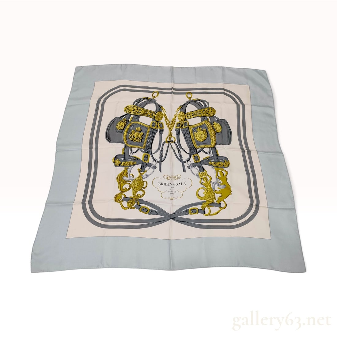 Hermes Brides de Gala Silk Carre Scarf by Hugo Grygkar: A Hermes 90cm silk twill carre scarf featuring the iconic Brides de Gala equestrian motif, originally designed by Hugo Grygkar in 1957. The composition centers on two highly detailed ceremonial horse 