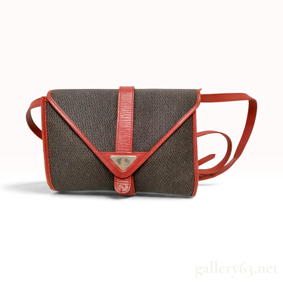 Vintage Yves Saint Laurent Monogram Woven Canvas and Red Leather Crossbody Handbag: A vintage Yves Saint Laurent envelope-flap crossbody handbag constructed from woven monogram canvas with a dark grey-brown field and red woven details. The bag features bright red leather trim, piping