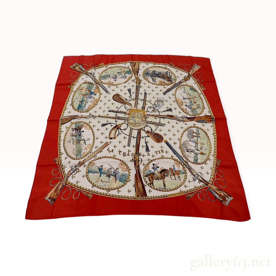 Hermes La Chasse a Tir Silk Scarf by Philippe Ledoux: An authentic Hermes 90cm silk carre titled La Chasse a Tir, featuring artwork by the celebrated French illustrator Philippe Ledoux. The scarf exhibits a classical hunting theme with a central ivory-co
