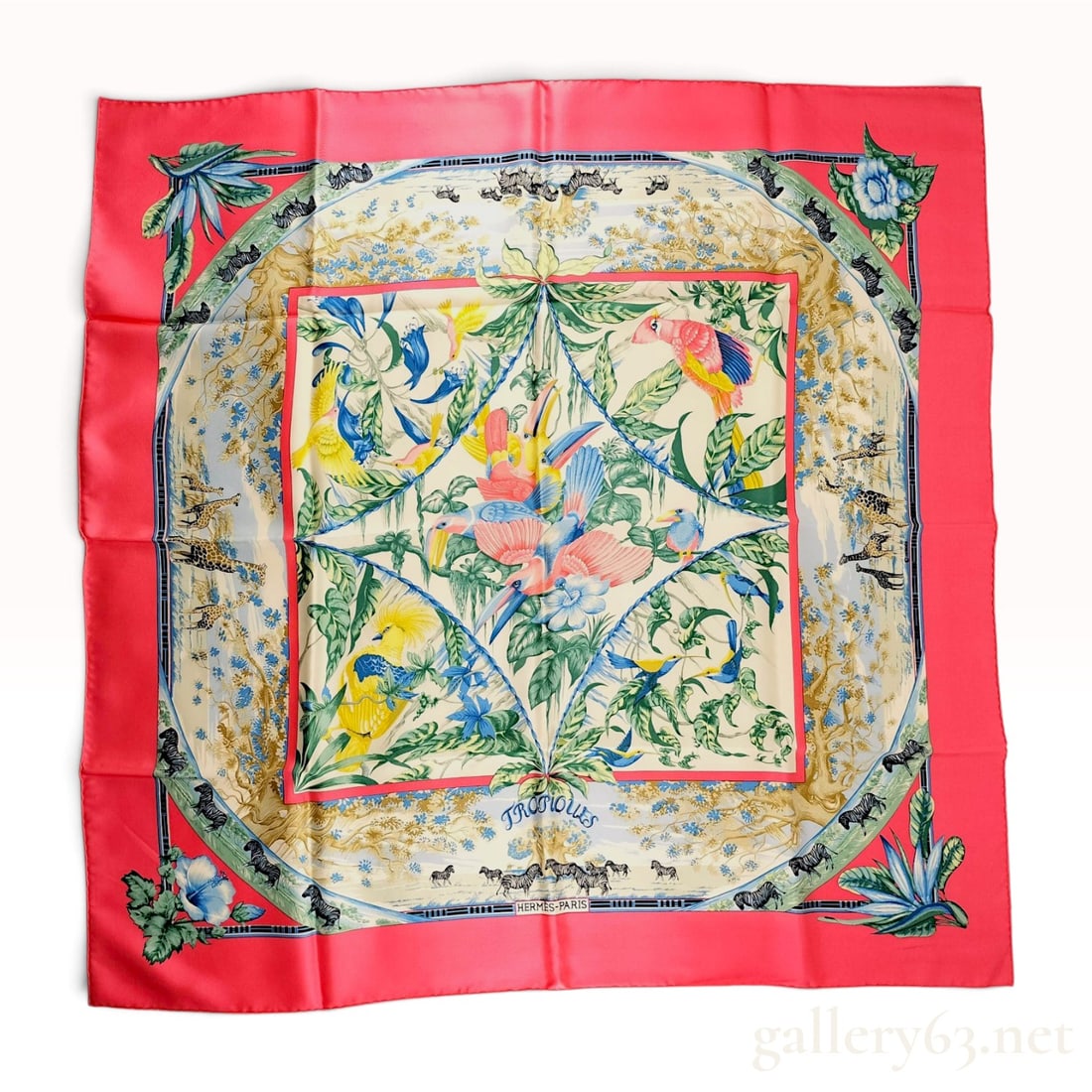 Hermes Tropiques Silk Carre Scarf designed by Laurence Bourthoumieux: An Hermes 90cm silk twill carre scarf featuring the Tropiques pattern designed by Laurence Bourthoumieux. The central composition consists of a diamond-shaped panel and an inner square frame filled wi