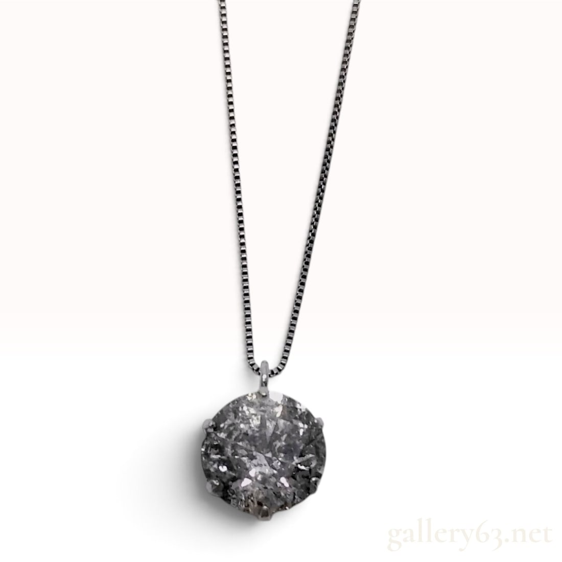 Platinum 1.313ct Natural Diamond Solitaire Pendant Necklace: This item is in excellent pre-owned condition. This solitaire pendant necklace features a single round brilliant-cut natural diamond weighing 1.313ct. The diamond is secured within a six-prong platinu