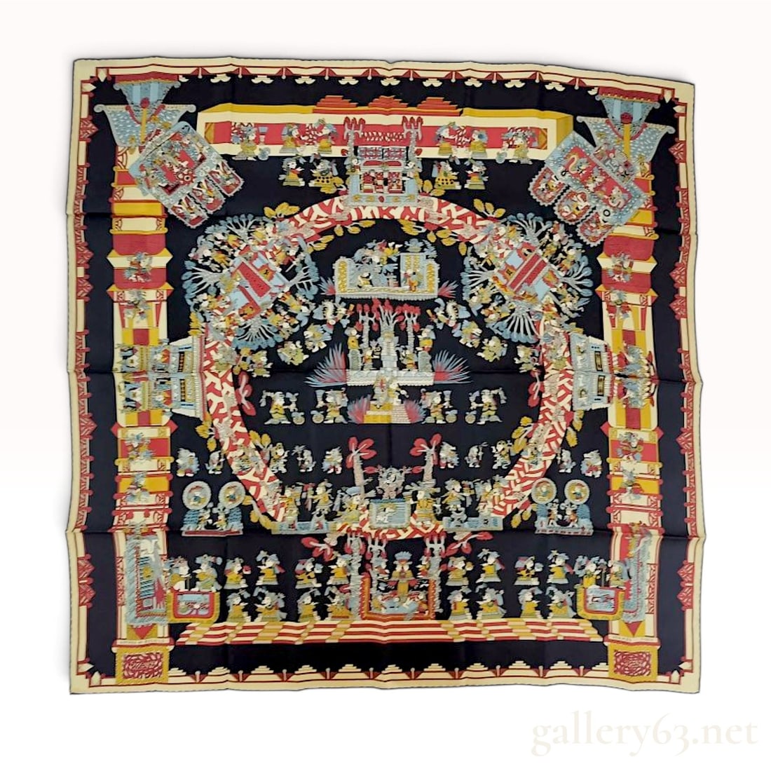 Hermes Astres et Soleils Silk 90 Scarf by Loic Dubigeon: This Hermes silk twill scarf features the Astres et Soleils pattern designed by artist Loic Dubigeon. The design displays a complex, symmetrical composition of pre-Columbian-inspired motifs, featuring