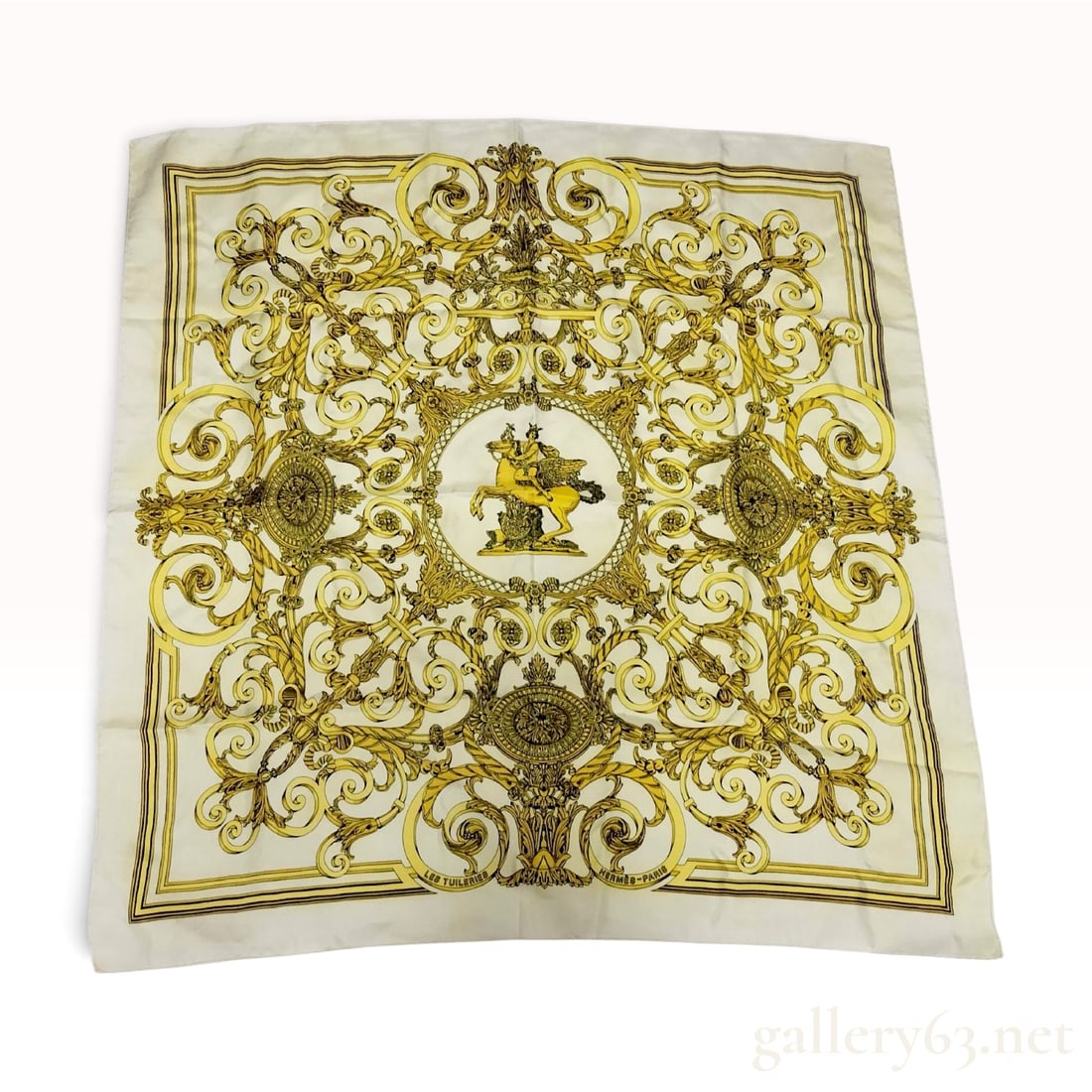 Hermes Les Tuileries Silk Scarf Designed by Joachim Metz 90 cm: This is a vintage Hermes silk twill scarf in the Les Tuileries pattern, designed by Joachim Metz and first issued in 1990. The design features a central medallion depicting the equestrian statue of Me