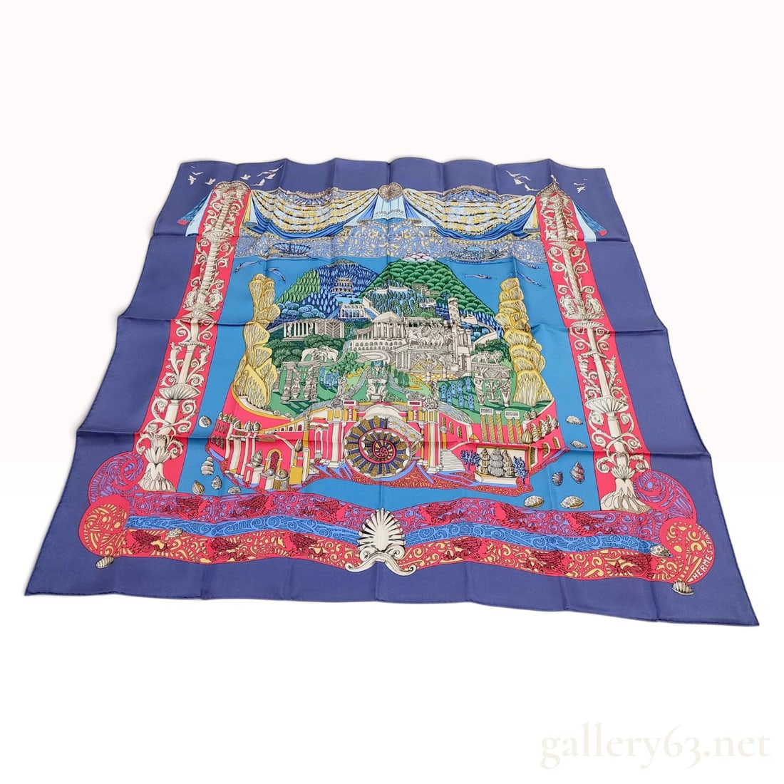 Vintage Hermes L'Atlantide (The Atlantis) Silk Carre 90: This Hermes silk carre 90 in the L'Atlantide (The Atlantis) pattern was designed by artist Annie Faivre. The composition features a highly detailed, fantastical classical landscape of the legendary lo
