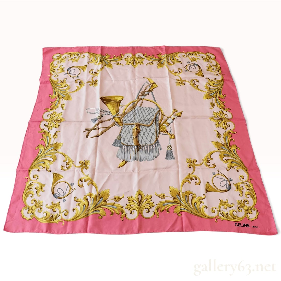 Vintage Celine Hunting Motif Pink Silk Scarf 90 cm: This Celine scarf is crafted from silk twill and features a traditional hunting and equestrian theme. The central design depicts a fringed hunting pouch, a hunting horn, a whip, and tassels against a 