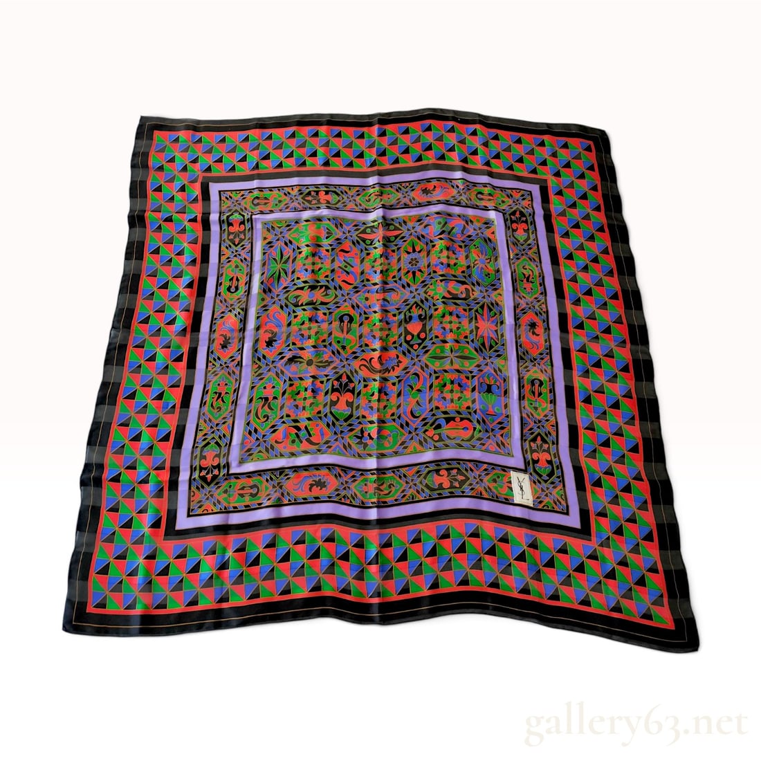 Vintage Yves Saint Laurent Geometric Botanical Silk Carre 90: This Yves Saint Laurent silk carre 90 is crafted from a fine silk featuring an intricate multicolored geometric and botanical design. The central field displays interlocking octagonal and diamond pane