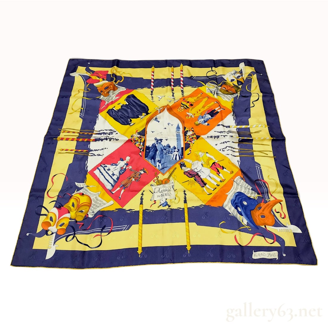 Vintage Hermes Le Carnaval de Venise (The Carnival of Venice) Silk Carre 90: This vintage Hermes silk carre 90 is crafted from a 100% silk jacquard fabric featuring a subtle woven pattern of violins and cellos throughout the field. The design, titled Le Carnaval de Venise and 