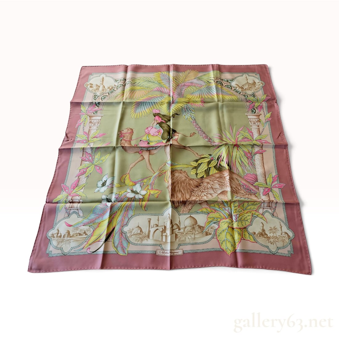 Salvatore Ferragamo Orientalist Arabian Motif Silk Scarf 90 cm with Box: This Salvatore Ferragamo silk scarf is crafted from silk twill with hand-rolled and hand-stitched edges. The design features a central Orientalist scene on a sage green ground depicting a figure in a 