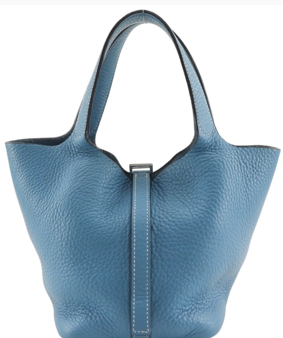HERMES PICOTIN LOCK 18 (PM), BLUE CLEMENCE, PALLADIUM: Description: Hermes Picotin Lock 18 (PM) in blue Taurillon Clemence leather with contrast white saddle stitching and palladium hardware. Bucket silhouette with double rolled top handles, pull-through