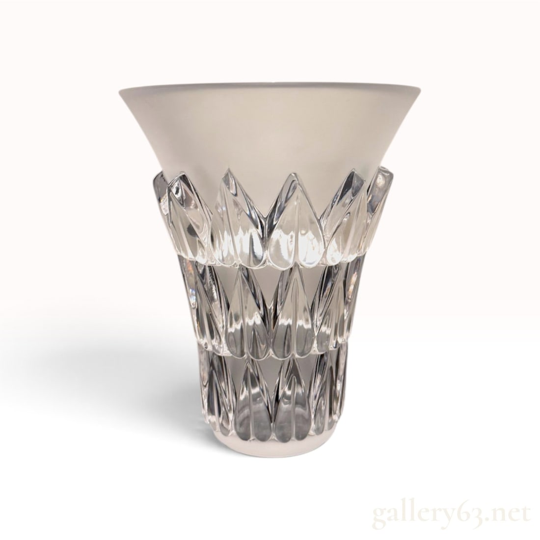 Lalique 'Feuilles' Vase -- Clear and Frosted Crystal, Signed Lalique France: A Lalique crystal vase in the Feuilles pattern, made in France, in clear and satin-frosted crystal. The vase flares from a straight lower body to a wide conical rim. Around the body, heart-shaped