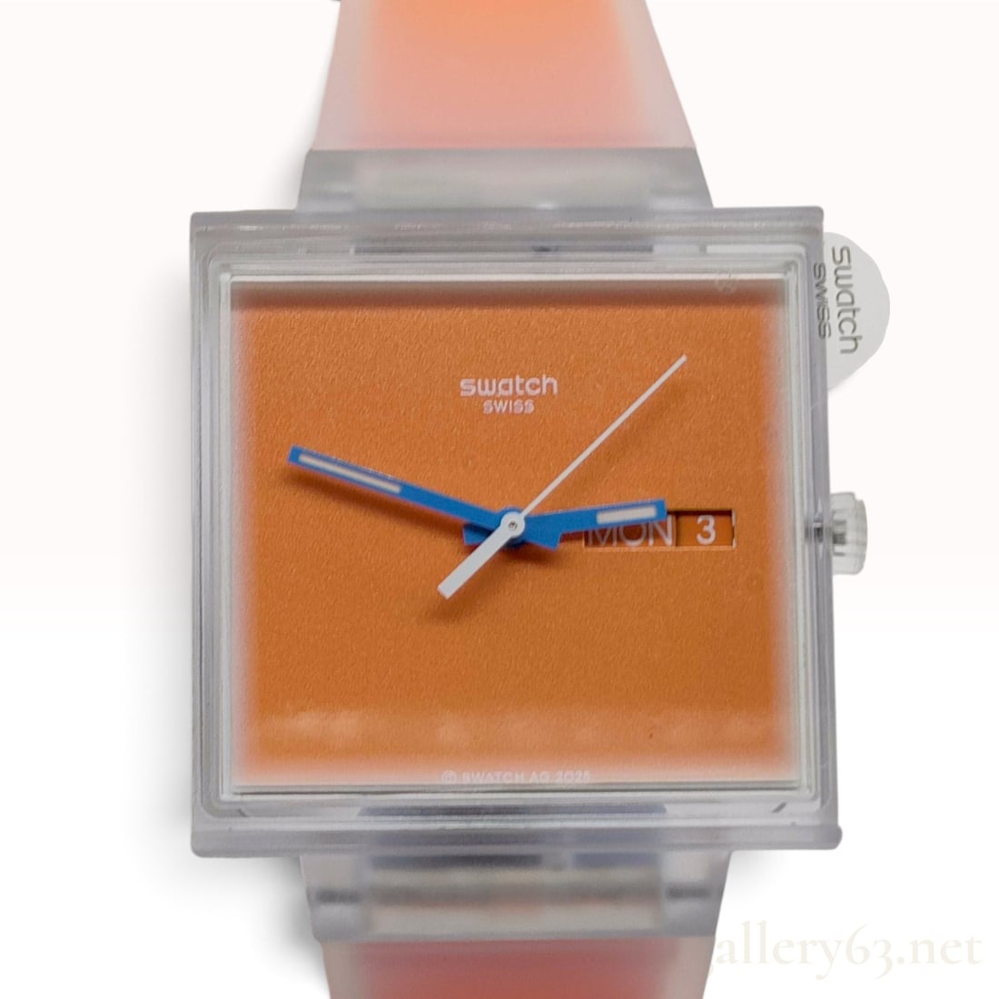 Swatch What If See Thru Orange Biosourced Resin 33mm Wristwatch: This Swatch wristwatch is from the Bioceramic What If collection, featuring a square case constructed from transparent matte biosourced material. The textured orange dial is designed with blue baton h