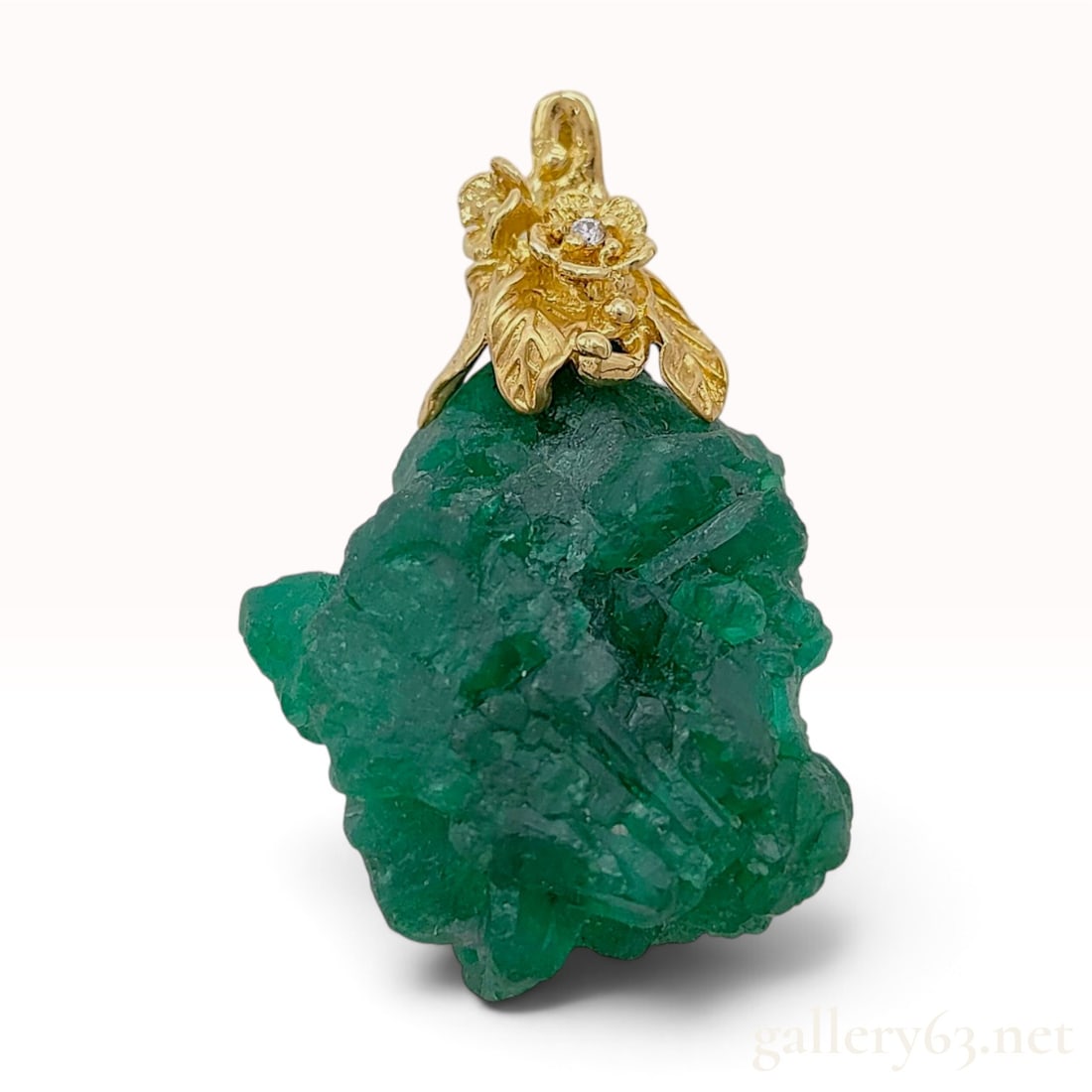 18KYG 46.30ct Natural Emerald and Diamond Floral Pendant w/ Certificate: This handcrafted pendant features a significant natural rough emerald crystal weighing 46.30 carats. The emerald displays a translucent deep green color with prominent natural internal inclusions and 