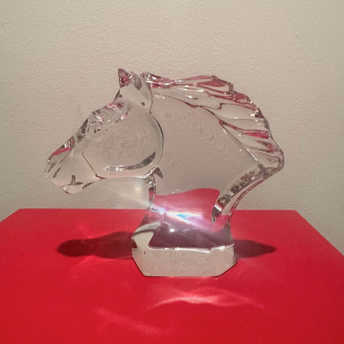 BACCARAT (French) -- 'Tete de Cheval' Clear Crystal Horse Head Sculpture, Signed, with Original Box: A Baccarat full-lead crystal sculpture modeled as a horse's head and neck, ears pricked and mane swept back in deep relief, rising from an integral faceted plinth. The modeling plays satin-finished pa