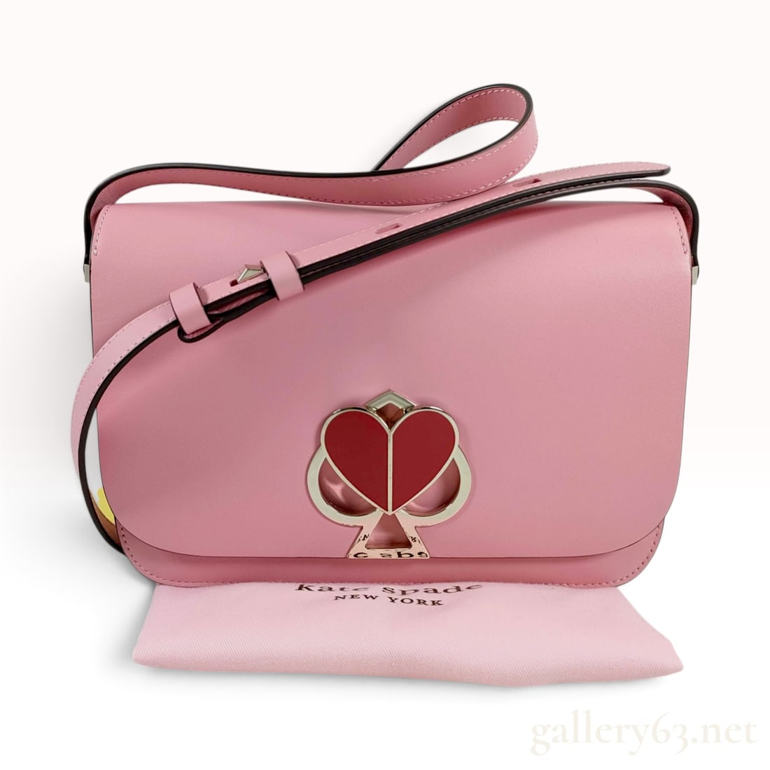 Kate Spade Nicola Twistlock Medium Pink Leather Shoulder Bag with Dust Bag: This Kate Spade New York Nicola Twistlock medium shoulder bag is crafted from smooth pink leather with a structured, rounded-bottom silhouette. The front flap features a signature spade heart twistloc