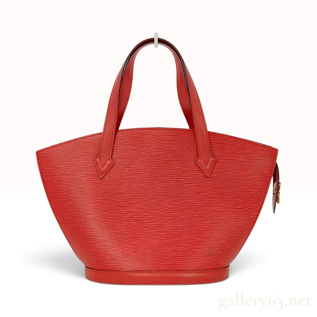 Vintage Louis Vuitton Saint-Jacques GM Red Epi Leather Tote Bag: This Louis Vuitton Saint-Jacques GM tote bag is crafted from red Epi leather with a distinctive fan-shaped silhouette. The exterior features dual flat leather shoulder straps and a top zipper closure.