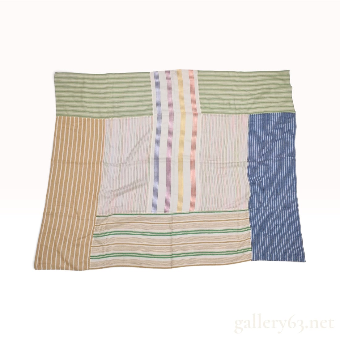 Hermes Patchwork Striped Multi-Color Cashmere Scarf: This Hermes scarf is crafted from 100% cashmere with 100% silk decoration in a complex patchwork-style striped pattern. The design consists of multiple panels featuring both horizontal and vertical st