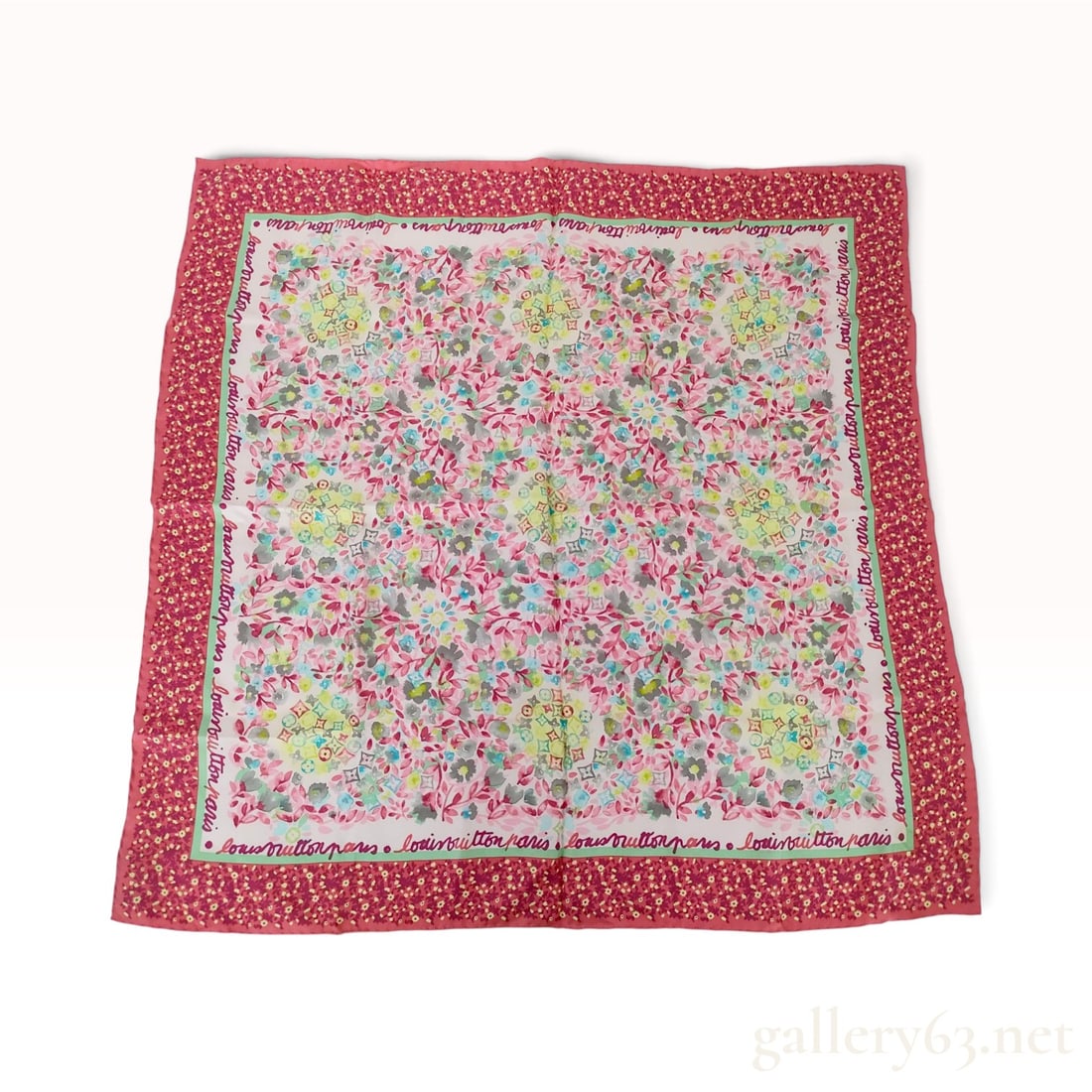 Louis Vuitton Floral Monogram Pink Multi Silk Scarf 67cm: A Louis Vuitton silk scarf featuring a floral monogram motif. The central field displays a multicolored watercolor-style floral design in shades of pink, blue, yellow, and green, integrating the house